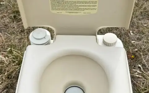 SaniPottie Portable Toilet SeaLand Dometic Camping