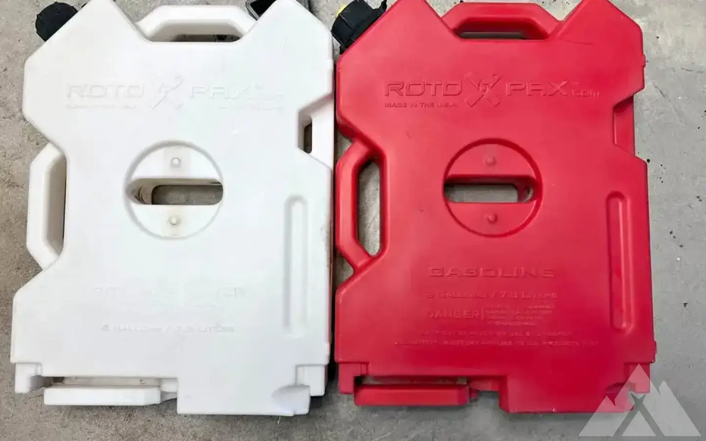Rotopax gas and water tanks. Never filled