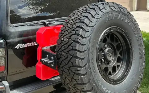 Dirt.com - Trail Swing Tire Holder.