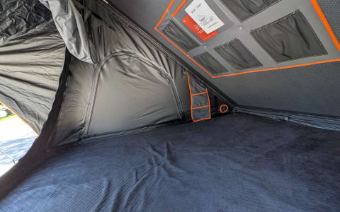 12 Toyota Sienna with Naturnest Rooftop Tent