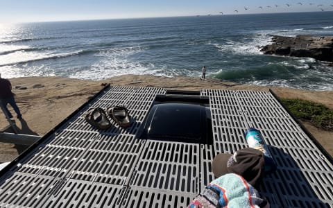 New, bright, clean, custom camper. Roof deck! Benc
