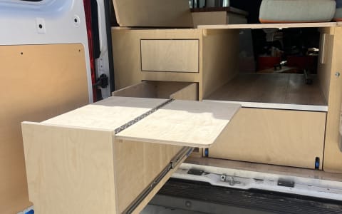 New, bright, clean, custom camper. Roof deck! Benc