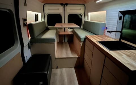 New, bright, clean, custom camper. Roof deck! Benc