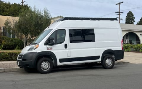 New, bright, clean, custom camper. Roof deck! Benc