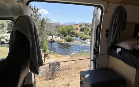 New, bright, clean, custom camper. Roof deck! Benc