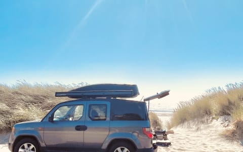 fully equipped solo glamping set up/ AWD Honda Ele
