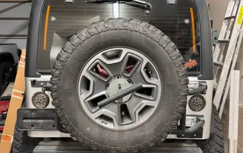 Swing out tire carrier jeep Tj