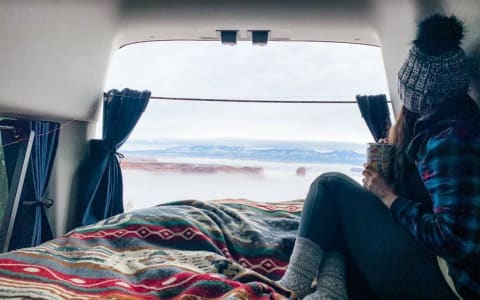 Stay Cozy in this 2022 Heated AWD Campervan w/ Que