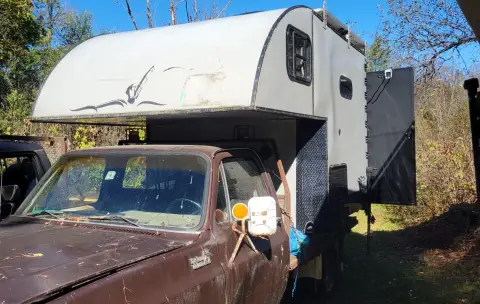 Custom built flatbed camper with aluminum bed