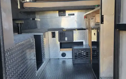 Custom built flatbed camper with aluminum bed