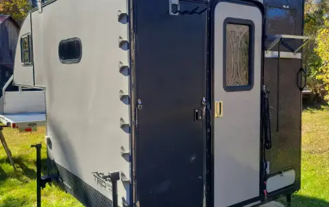 Custom built flatbed camper with aluminum bed