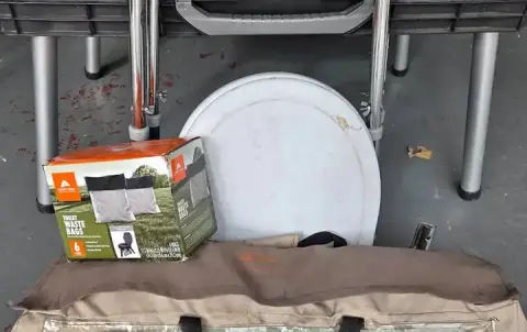 Portable toilet/shower